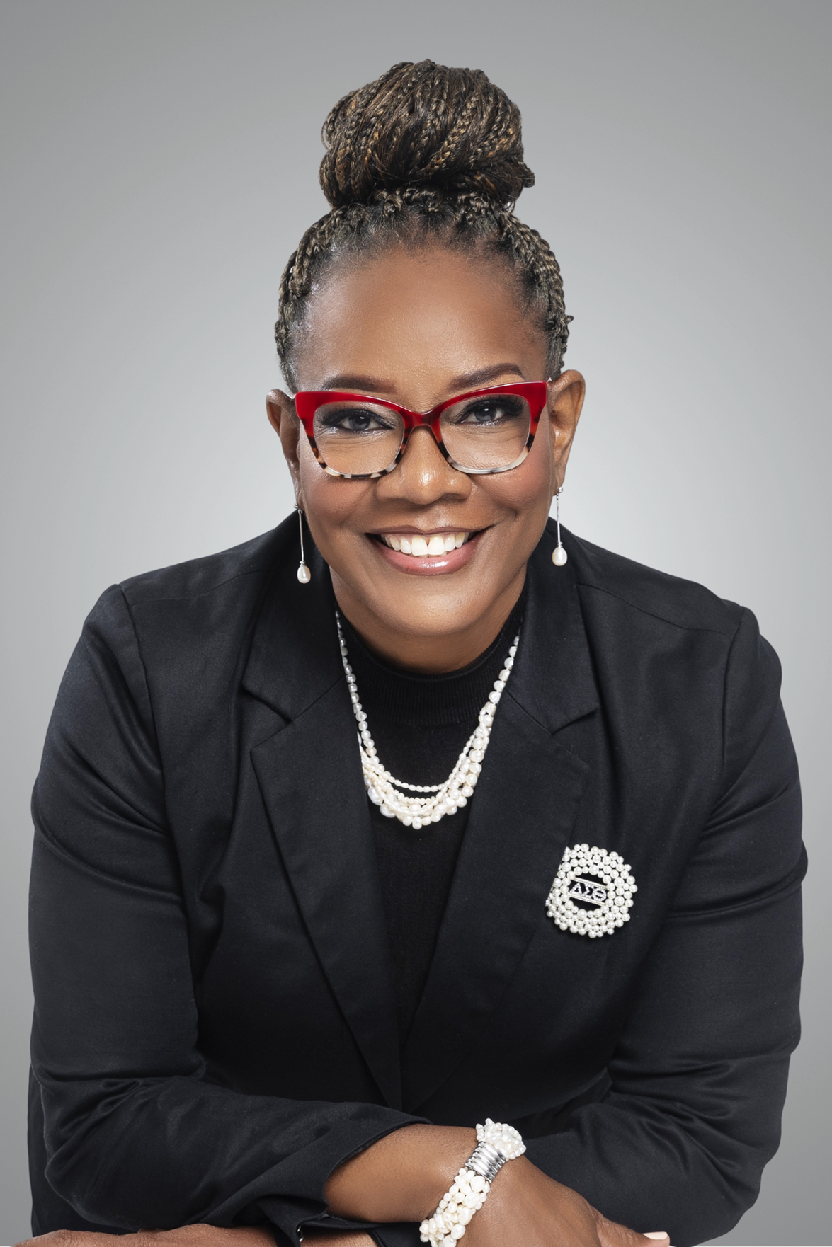 Janelle Baker, Ph.D., APRN, AGPCNP-C, PMHNP-BC.